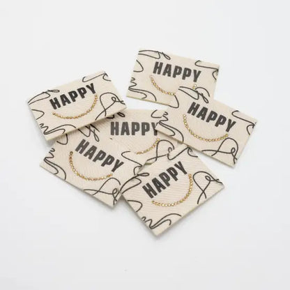 Etiquette tissée HAPPY